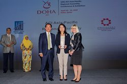 Fred Lam , Chief Executive Officer of AA and Vivian Cheung, Deputy Director, Airport Operations of AA receive the Silver Recognition in the